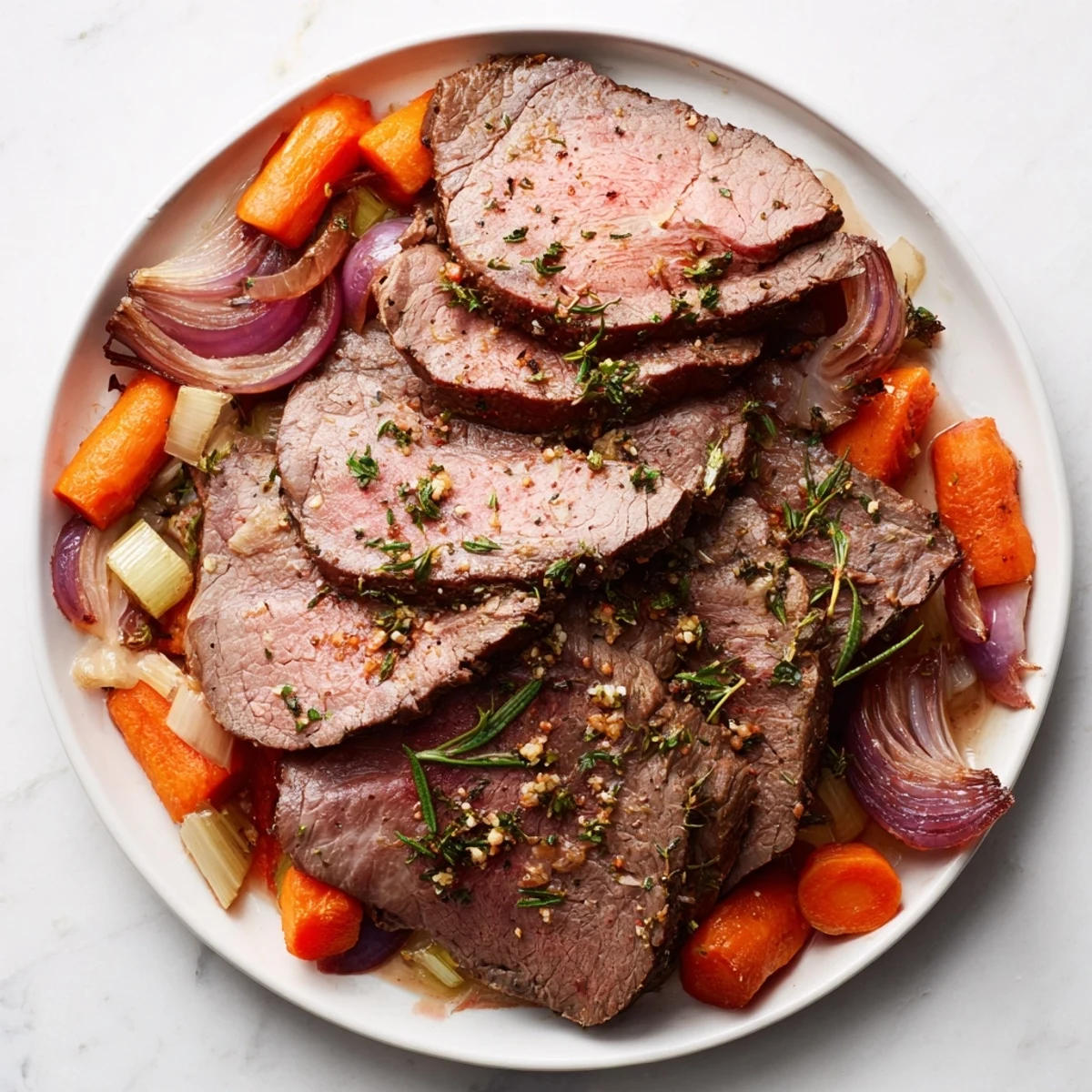Golden, glistening Slow Roasted Beef, fork-tender and ready to shred for a comforting dinner.