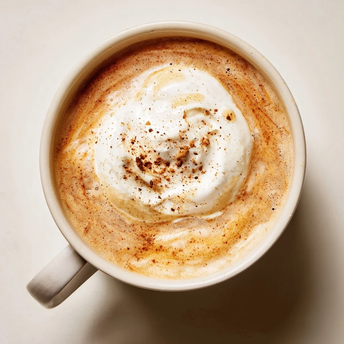 Aromatic spices infuse this beautiful Spiced Latte; imagine the comforting warmth in every sip.
