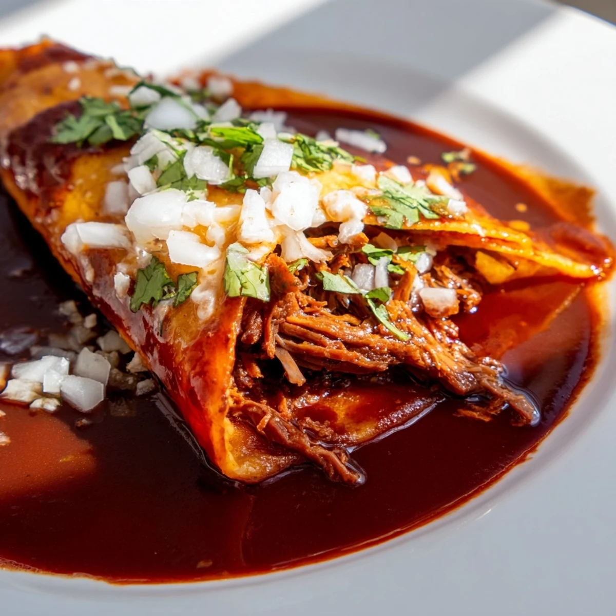 Golden-brown, crispy Slow Cooker Beef Birria Tacos stacked high, showcasing tender shredded beef and melted cheese.
