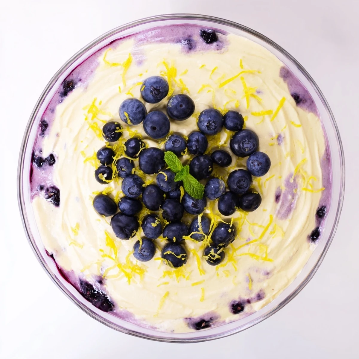 Airy Lemon Blueberry Mousse layered with blueberry compote and lemon curd, served chilled in glasses