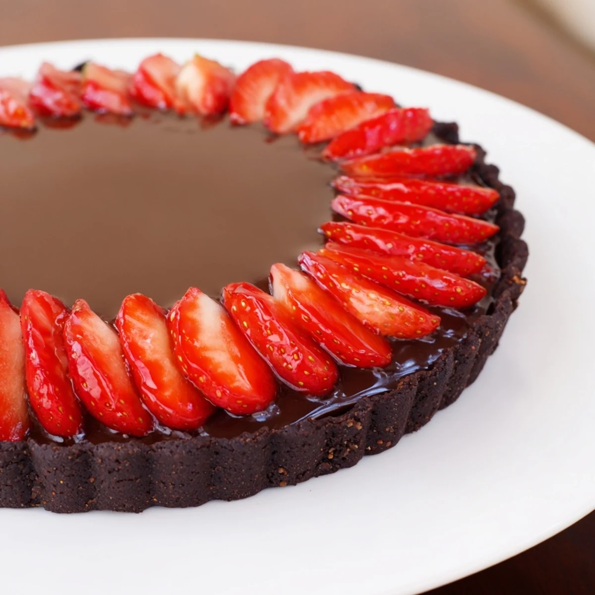 Dark Chocolate Strawberry Tart Recipe with crisp chocolate crust and glossy ganache