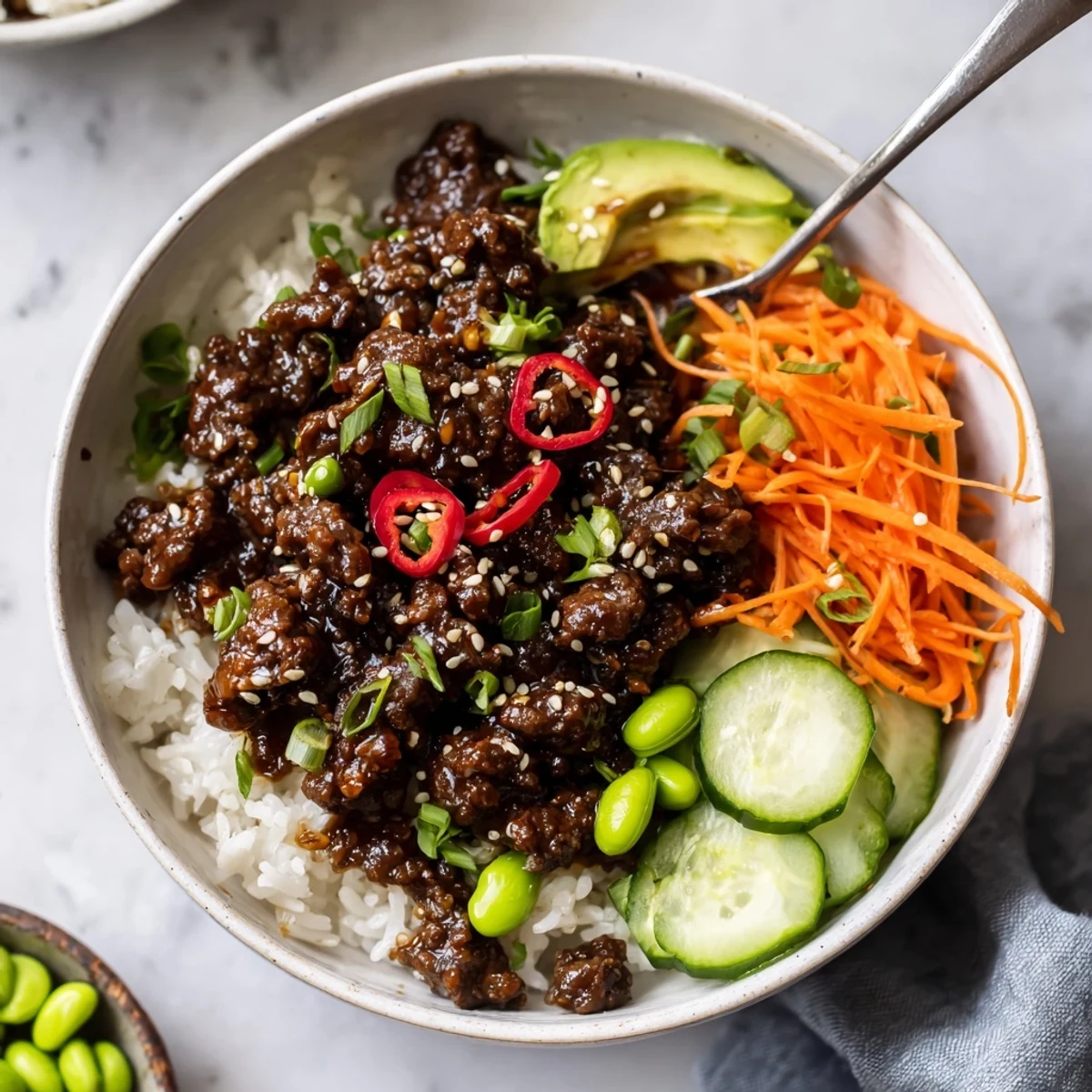 Garnished with avocado, Viral Ground Beef Hot Honey Bowl offers bright, balanced sweet heat