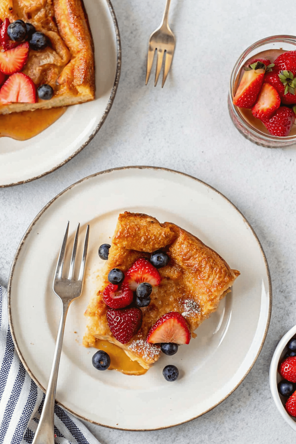 Gluten free Dutch baby pancake with berries on table
